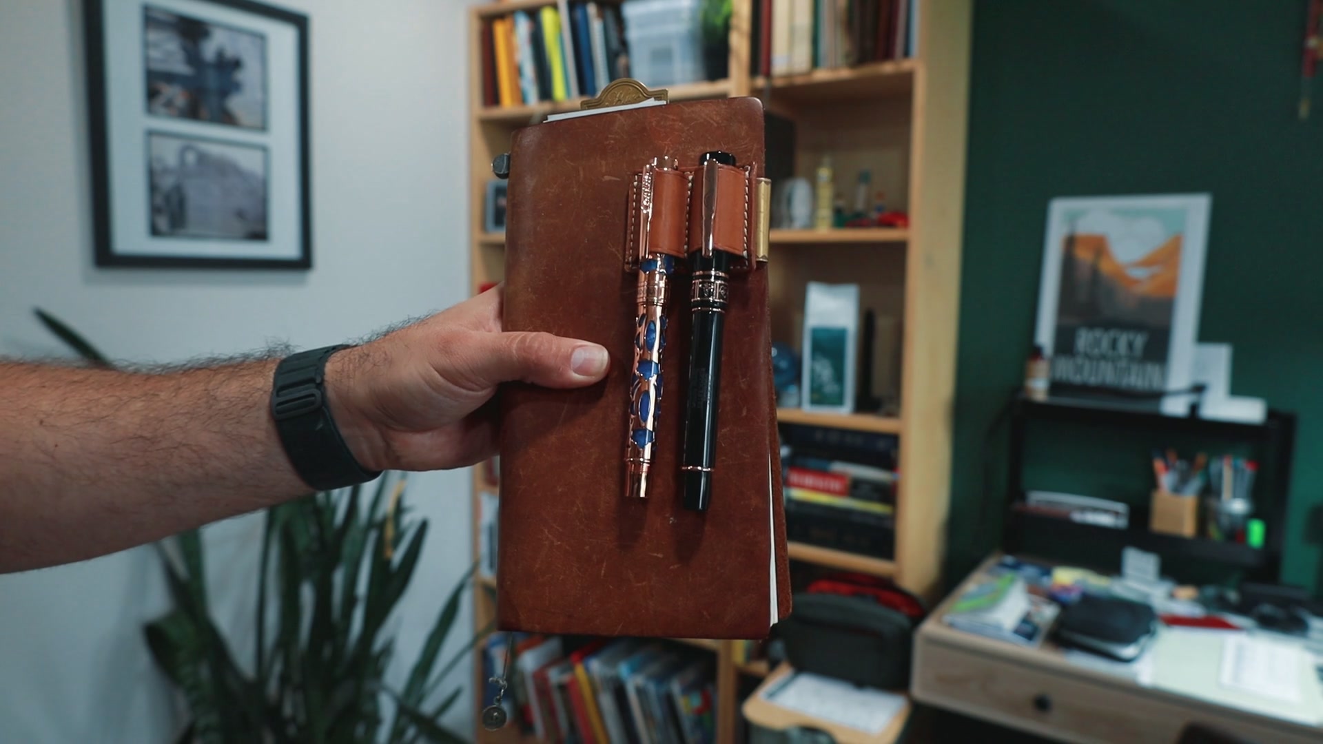 A Traveler's Notebook held open at a written page